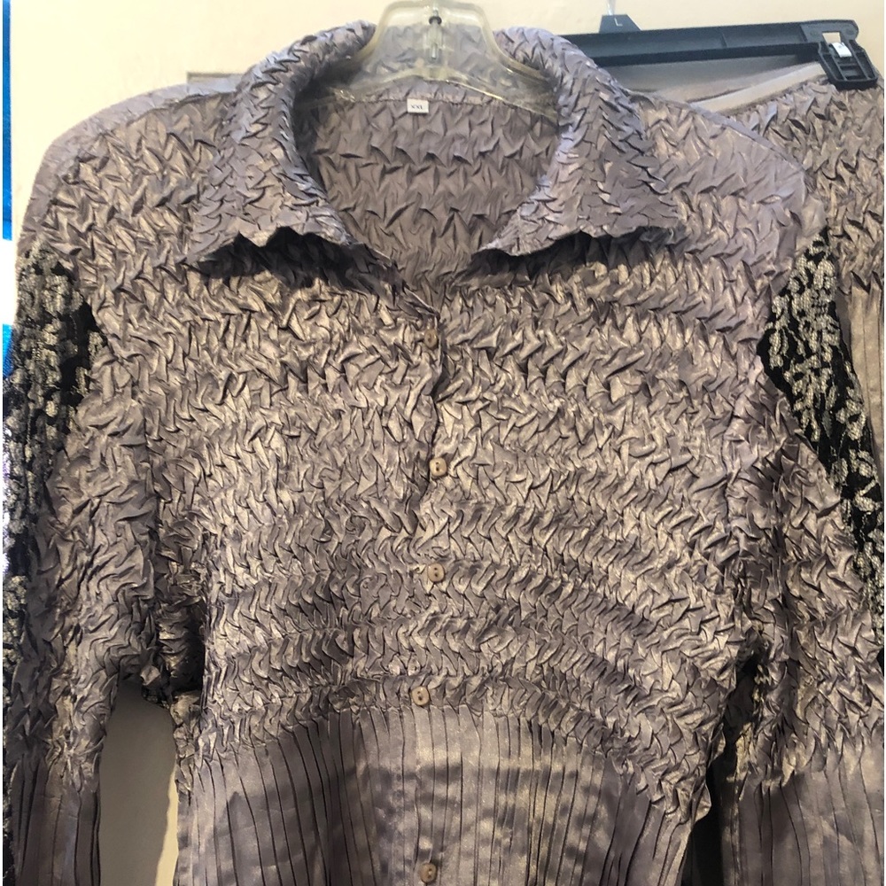 Two piece gray shiney blouse and pants set with gray and black lace.
